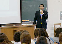 Man speaking to students